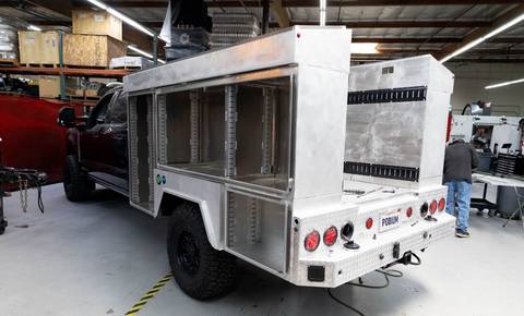 Podium aluminum service bed on a Ford F-350, rear three-quarter view